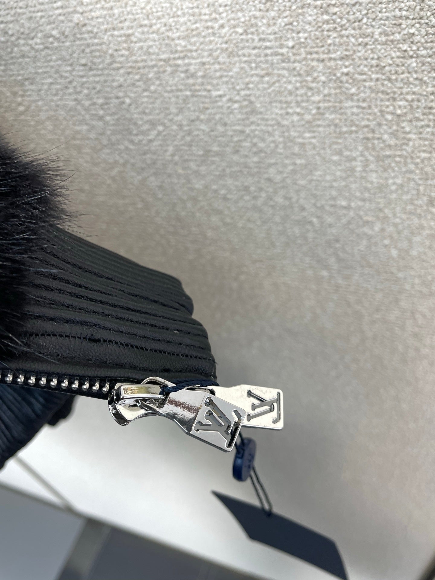 BLACK FAUX FUR HOODED JACKET WITH CONTRAST PATTERN