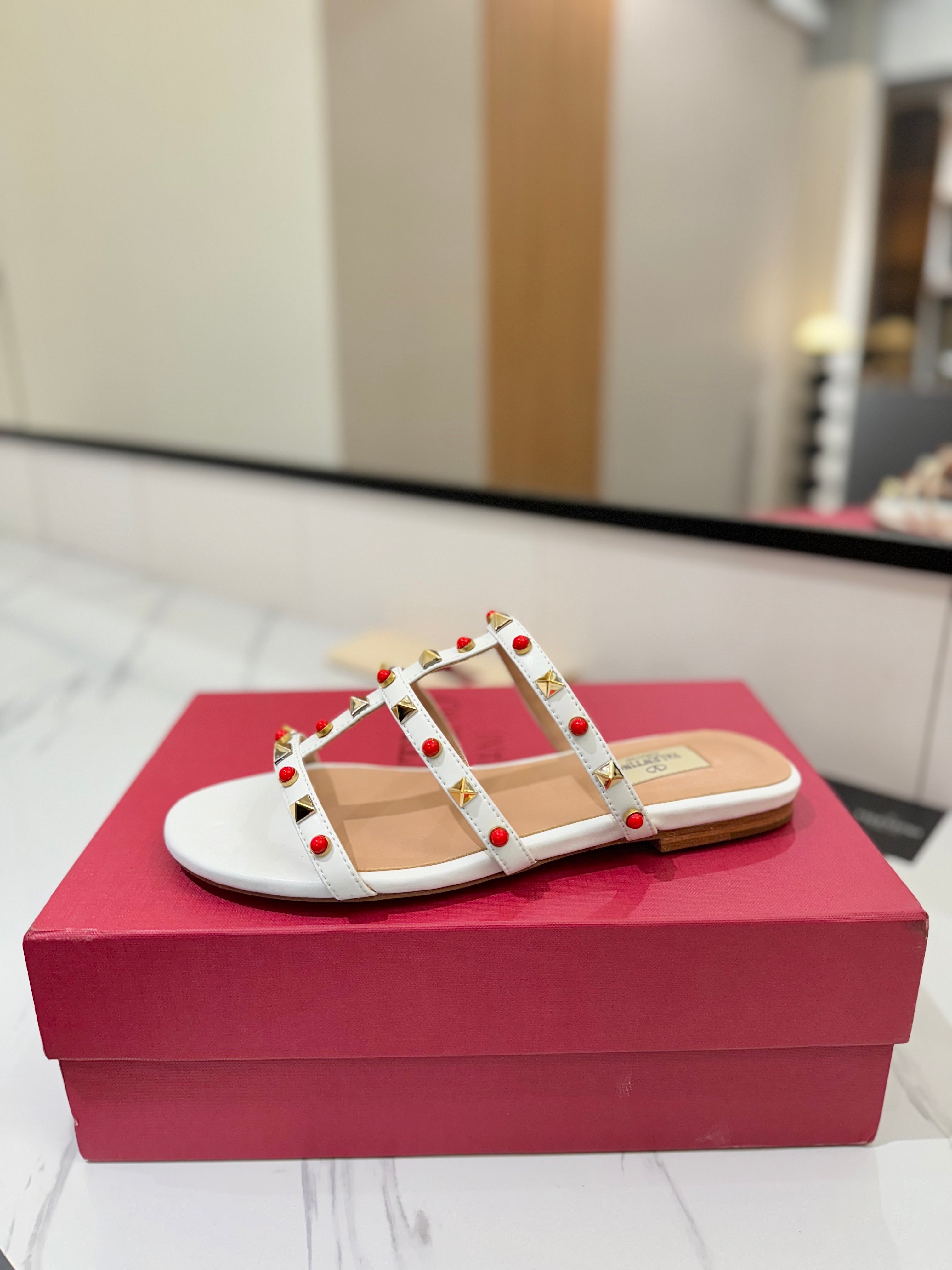 STUDDED STRAP FLAT SANDALS – WHITE WITH RED ACCENTS