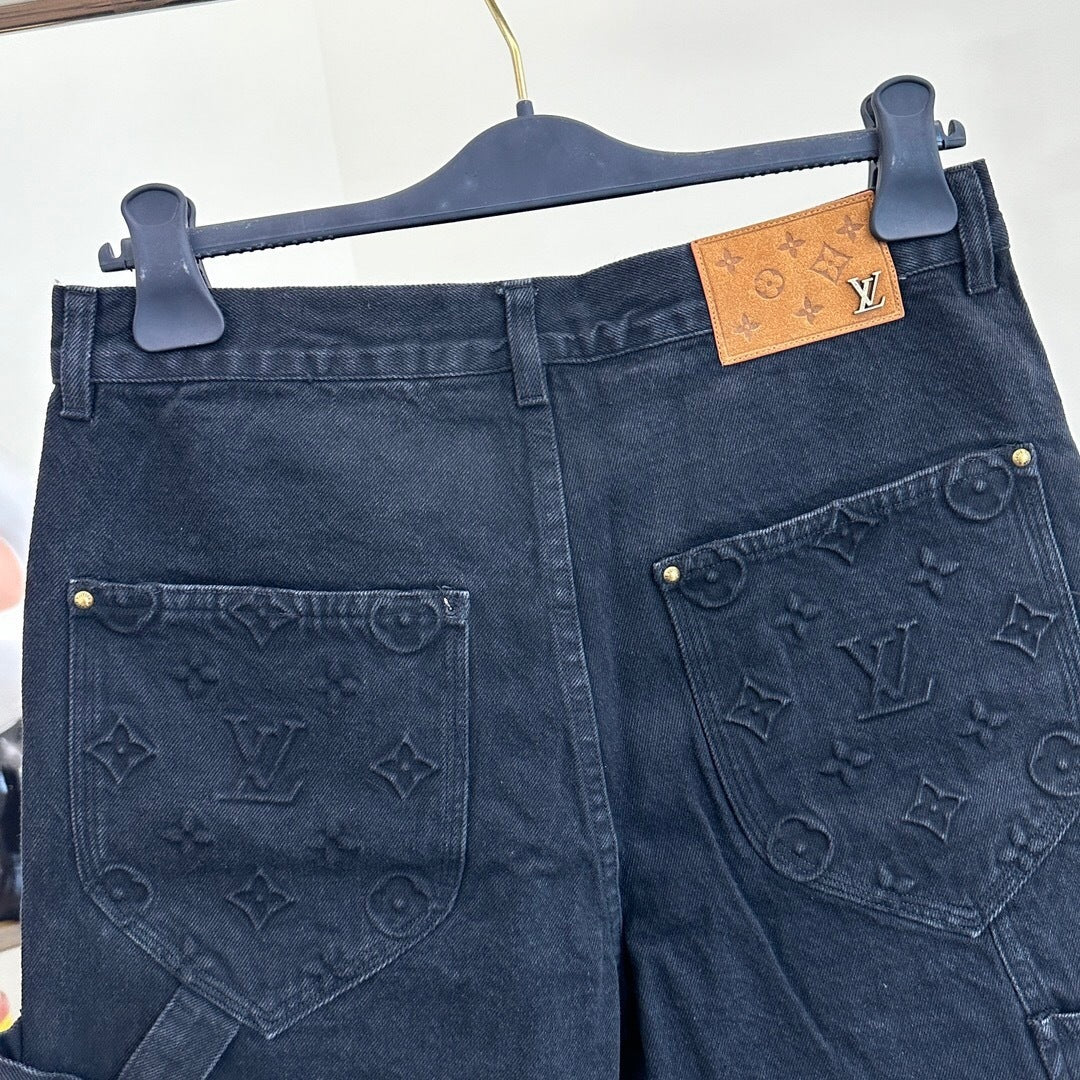 MONOGRAM EMBOSSED DENIM SHORTS