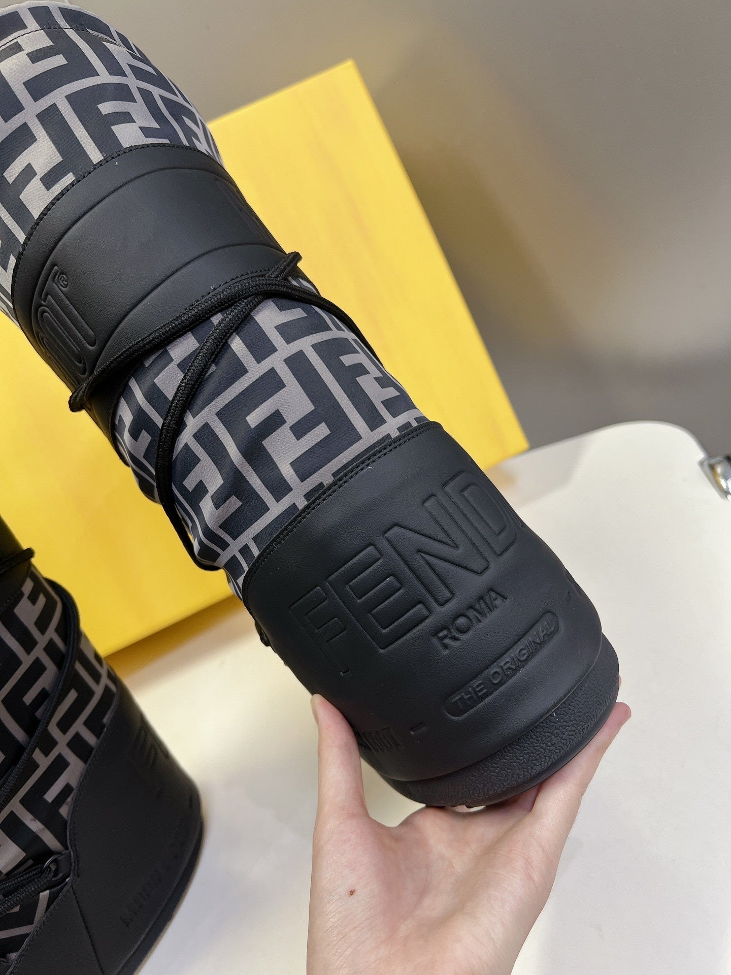 BLACK MONOGRAM-PRINT PADDED WINTER BOOTS