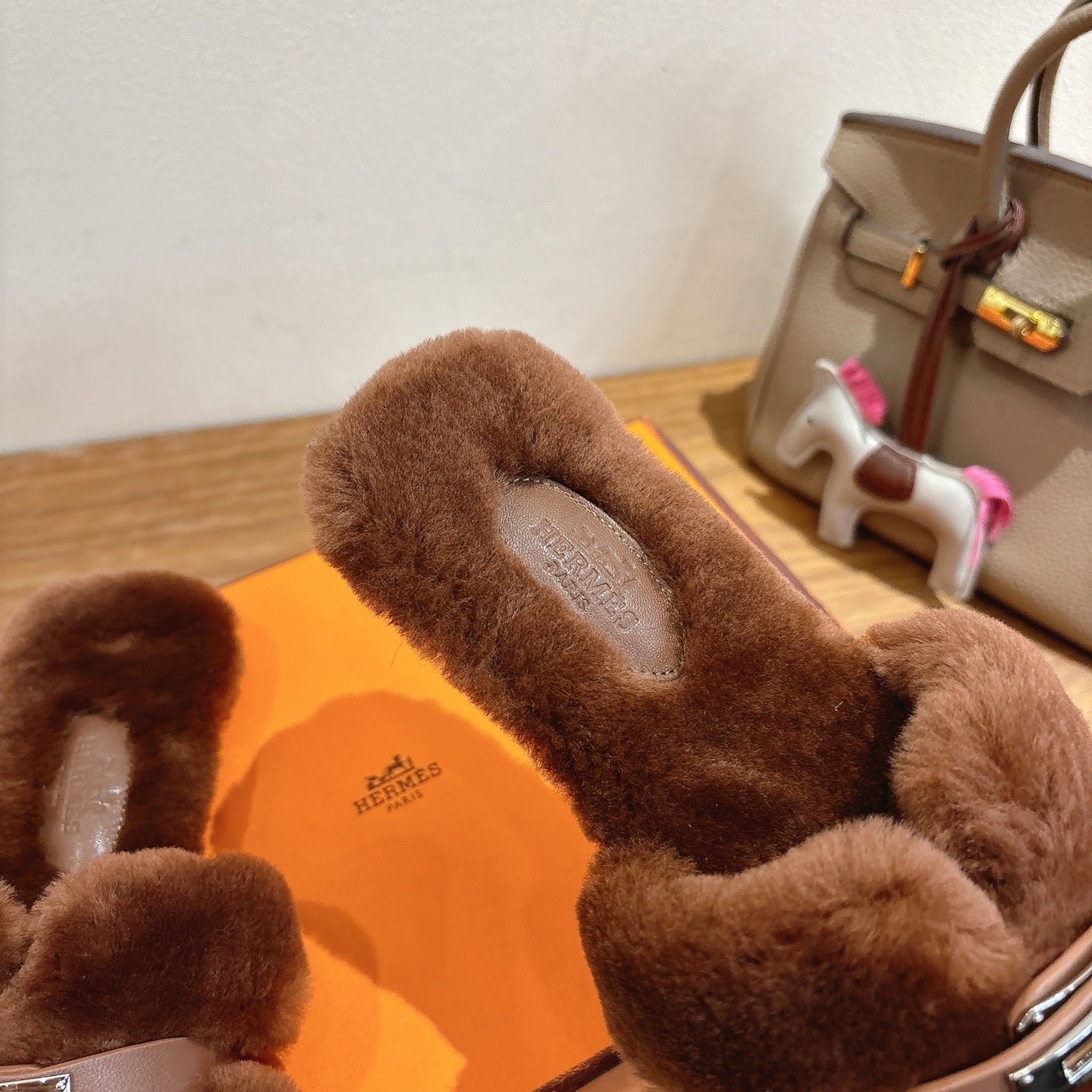 BROWN FAUX FUR MULE SLIPPERS WITH SILVER-TONE ACCENT