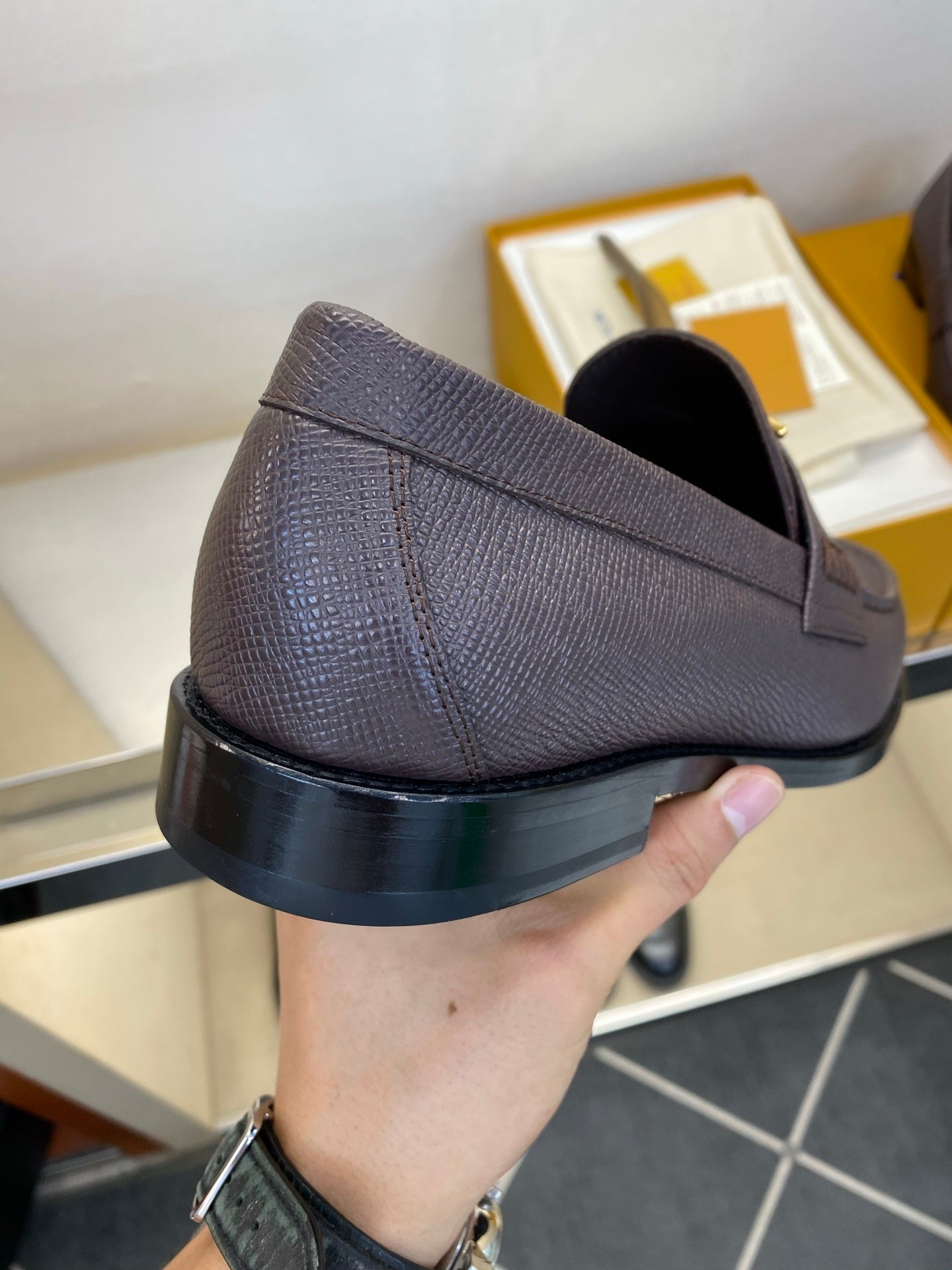 BROWN LEATHER SLIP-ON LOAFERS WITH GOLD-TONE ACCENT