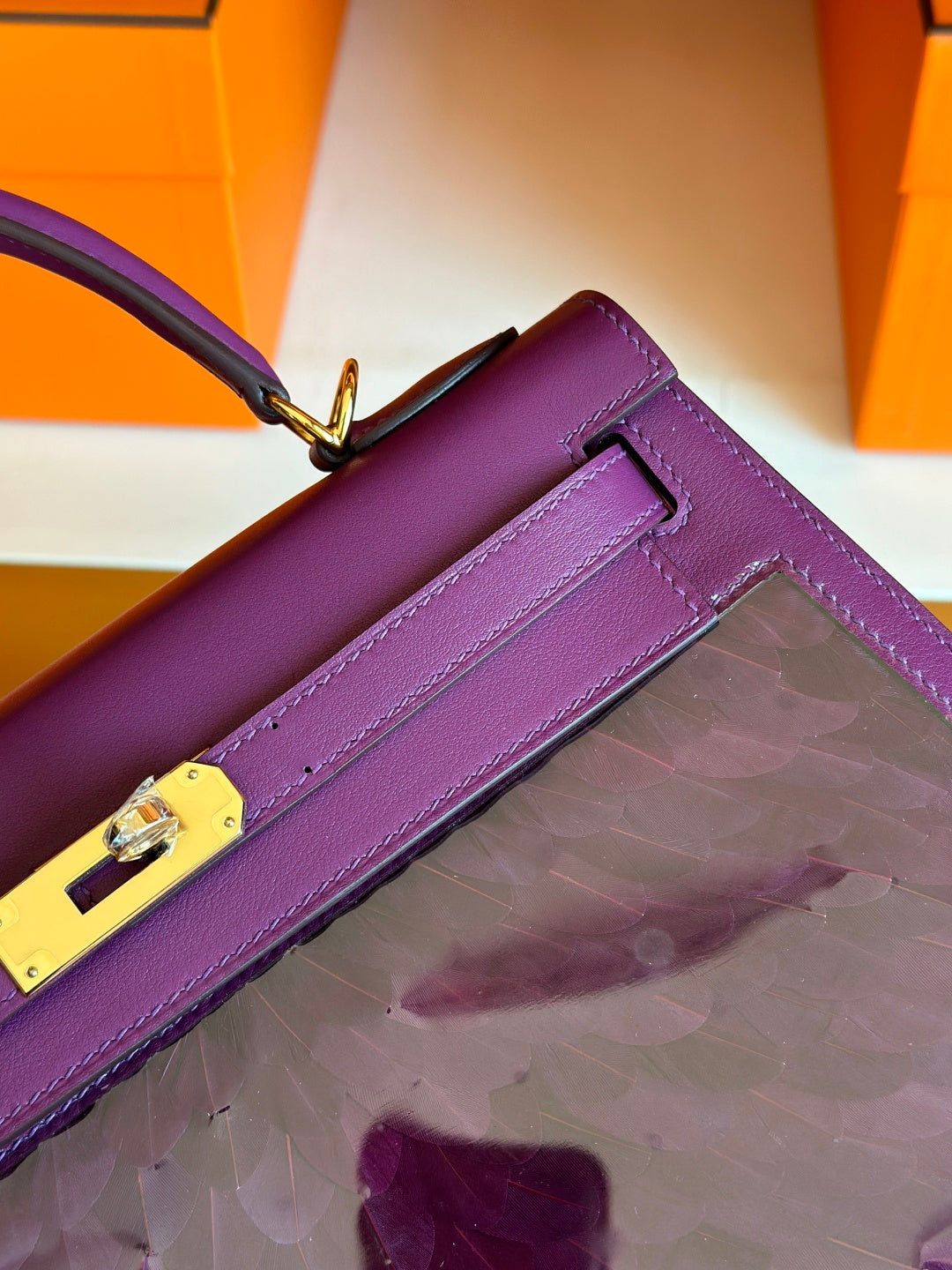 PURPLE FEATHER KELLY