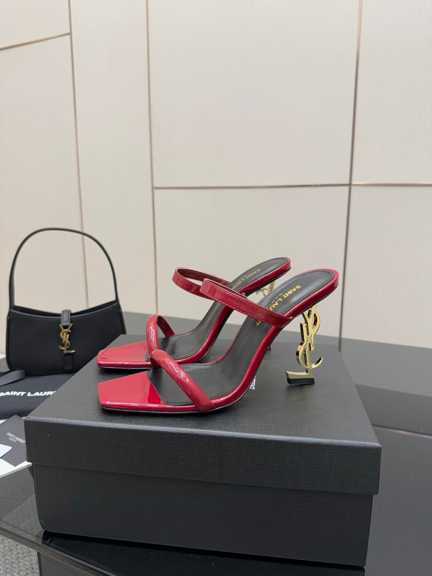 GLOSSY RED STRAPPY HEELS WITH GOLD LOGO HEEL