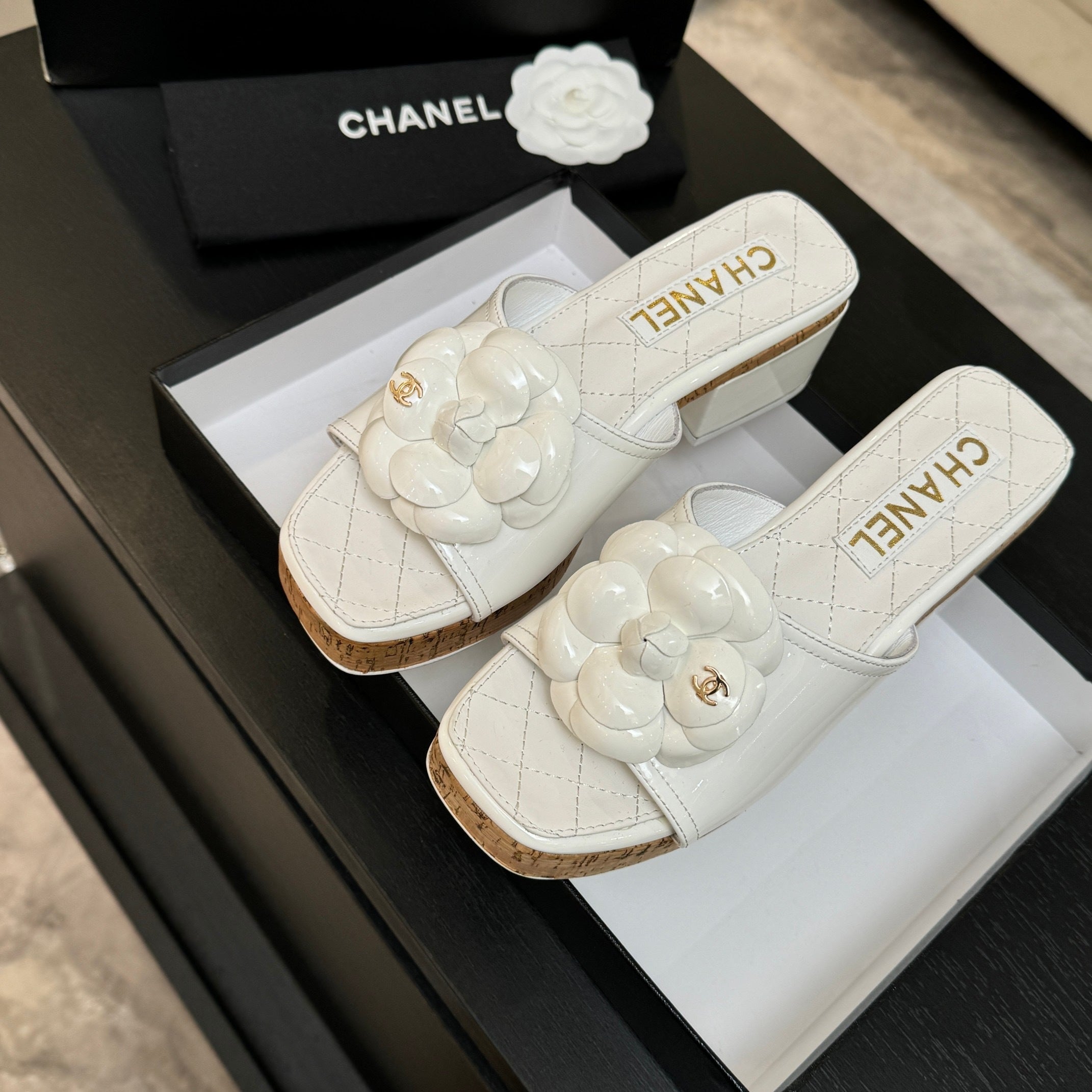 IVORY QUILTED PLATFORM SLIDE SANDALS WITH CAMELLIA DETAIL