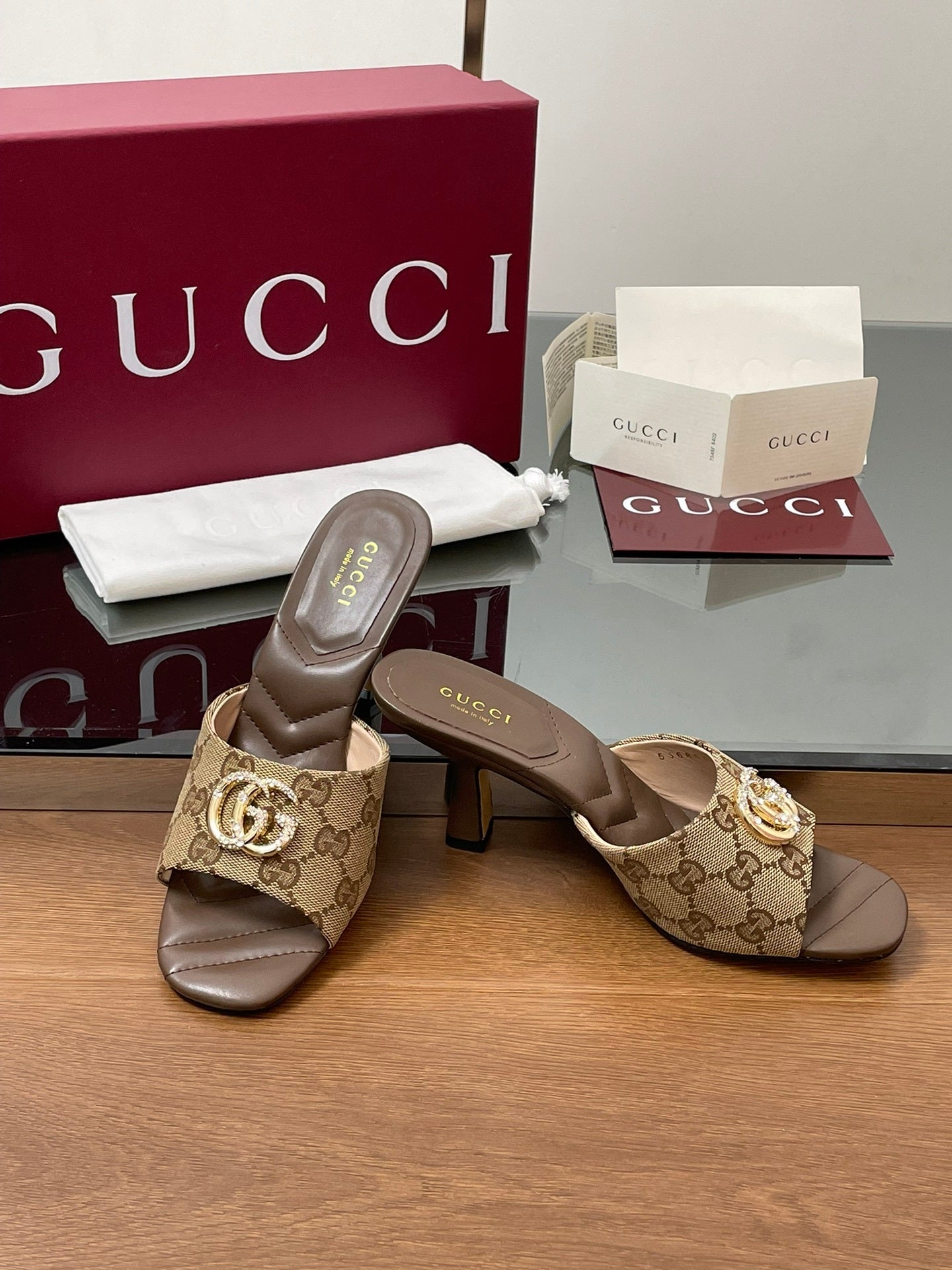 MONOGRAM BLOCK HEEL SLIDES