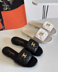 BLACK QUILTED GOLD-TONE ACCENT SLIDE SANDALS