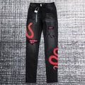 SNAKE GRAPHIC DISTRESSED SKINNY JEANS