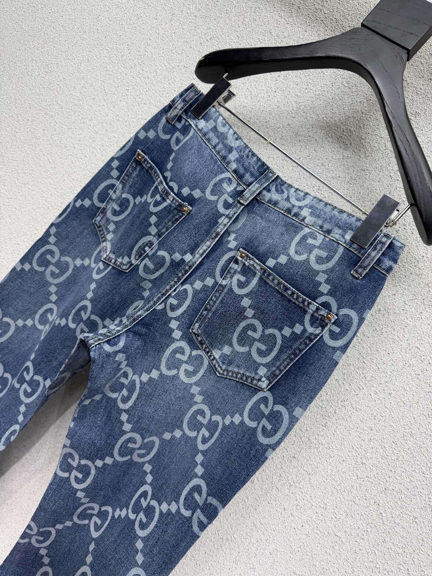 MONOGRAM PRINT FLARED DENIM JEANS