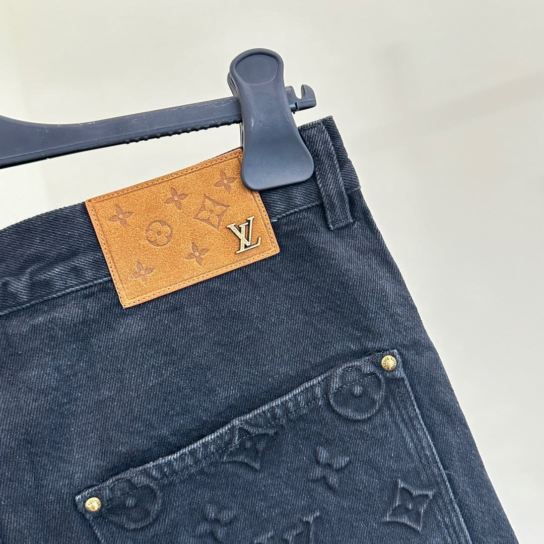 MONOGRAM EMBOSSED DENIM SHORTS