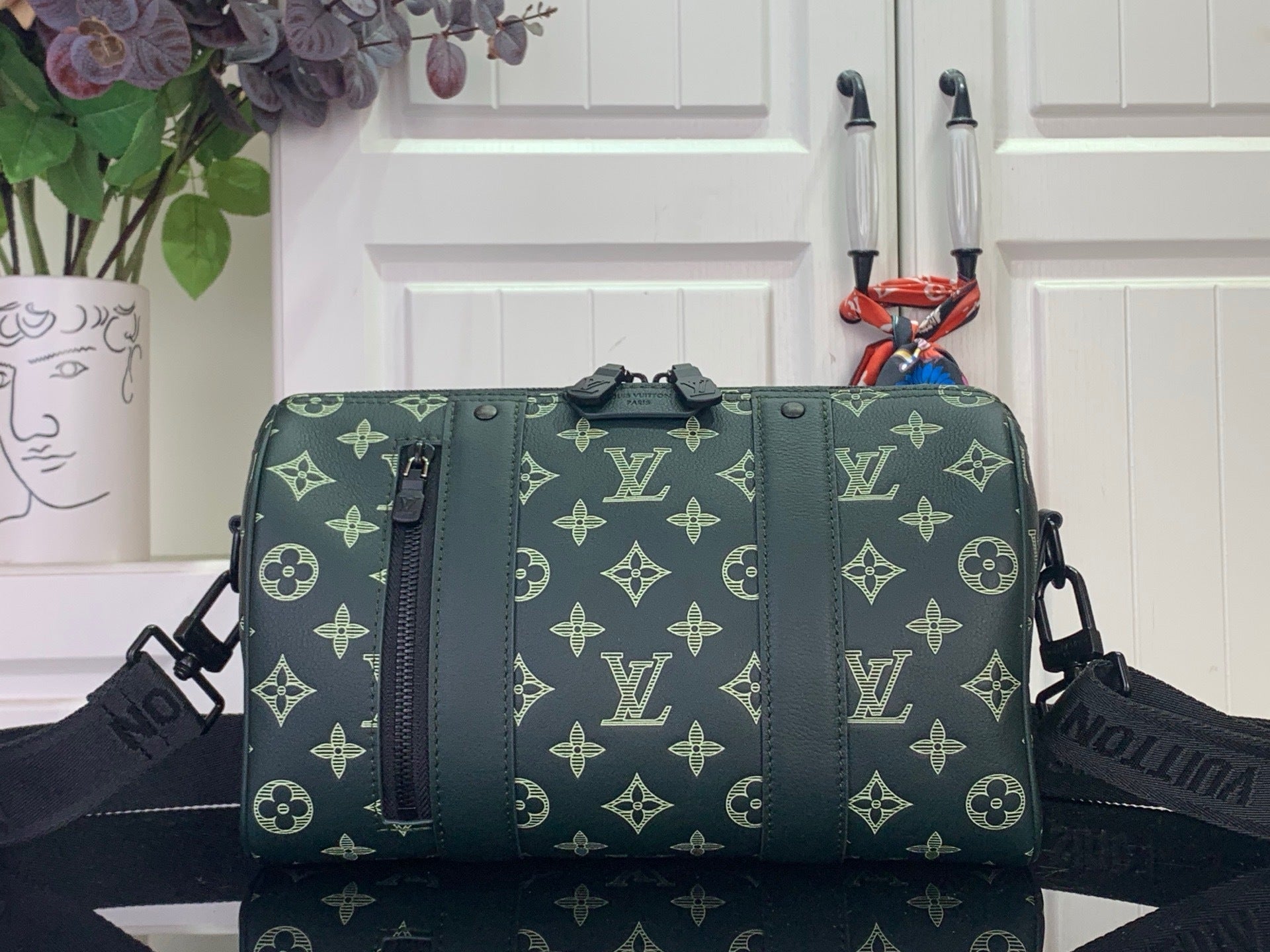 SPORTY BARREL CROSSBODY BAG