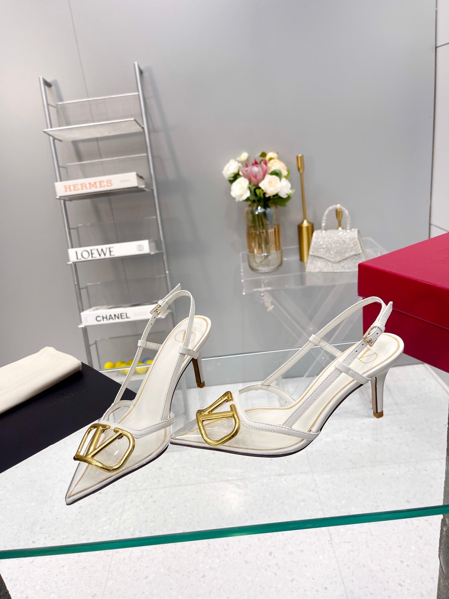 CLEAR SLINGBACK HEELS – ELEGANT WHITE WITH GOLD LOGO DETAIL