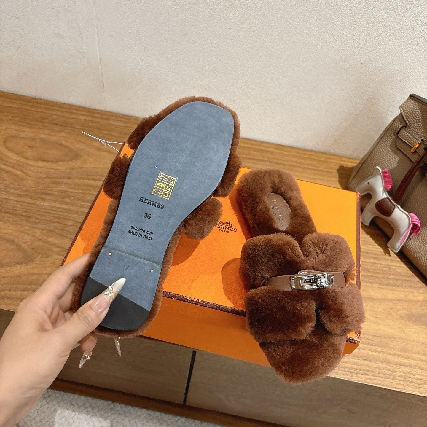 BROWN FAUX FUR MULE SLIPPERS WITH SILVER-TONE ACCENT