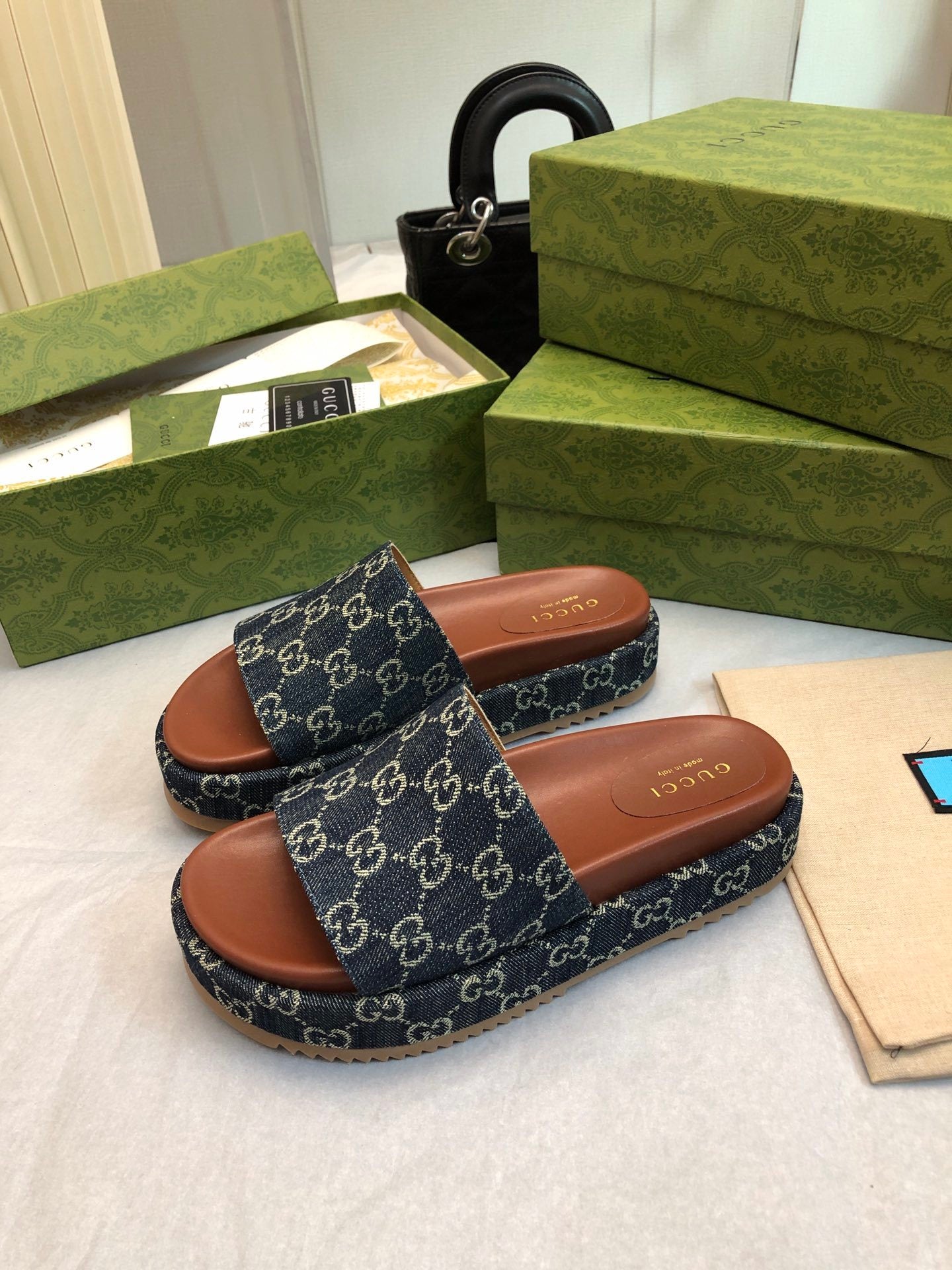 DENIM MONOGRAM PLATFORM SLIDES