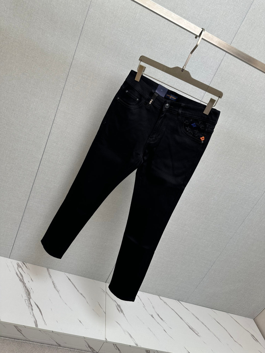 BLACK DENIM JEANS WITH EMBROIDERED DETAILING