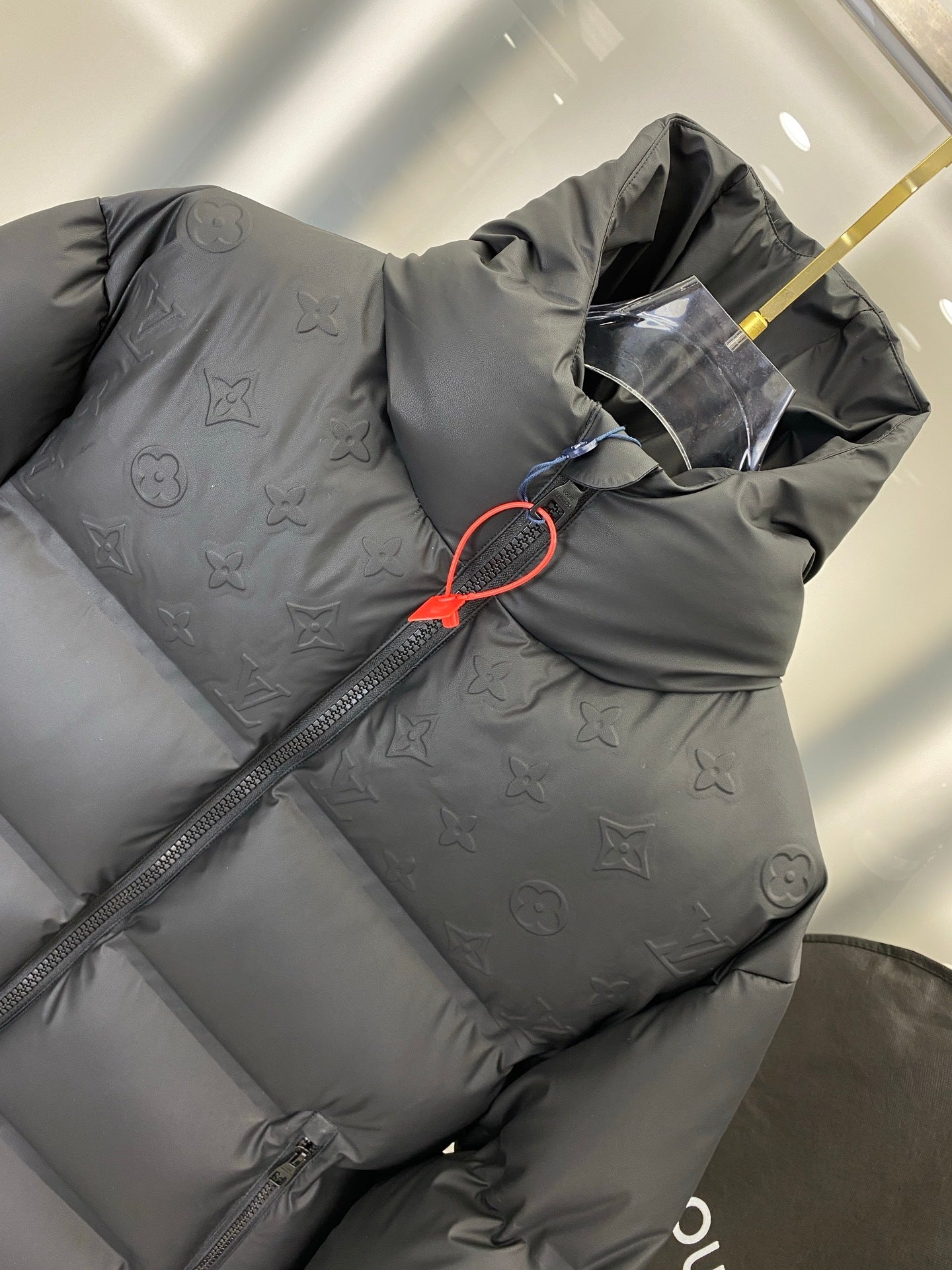 HOODED PUFFER JACKET WITH EMBOSSED PATTERN