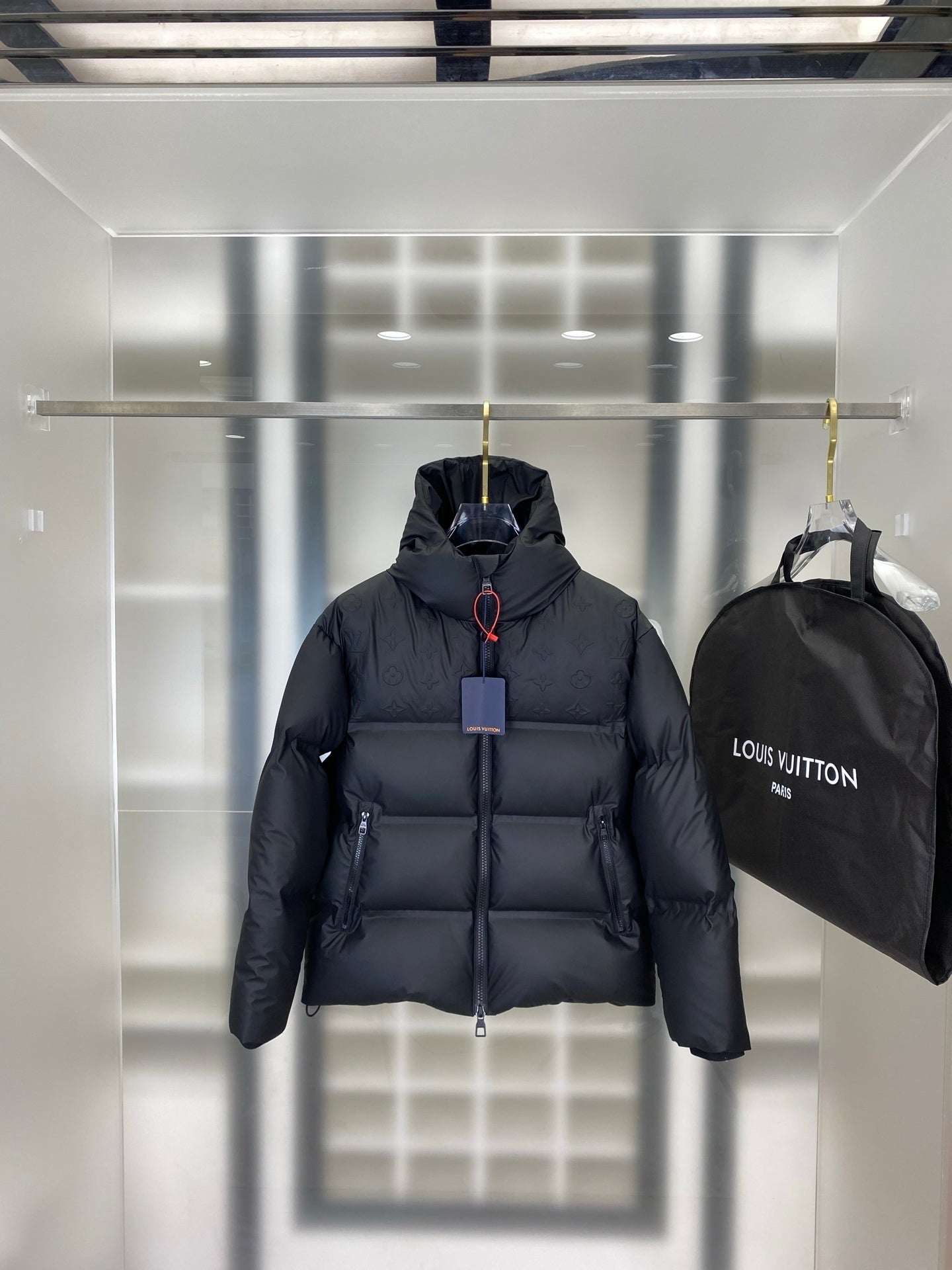 HOODED PUFFER JACKET WITH EMBOSSED PATTERN