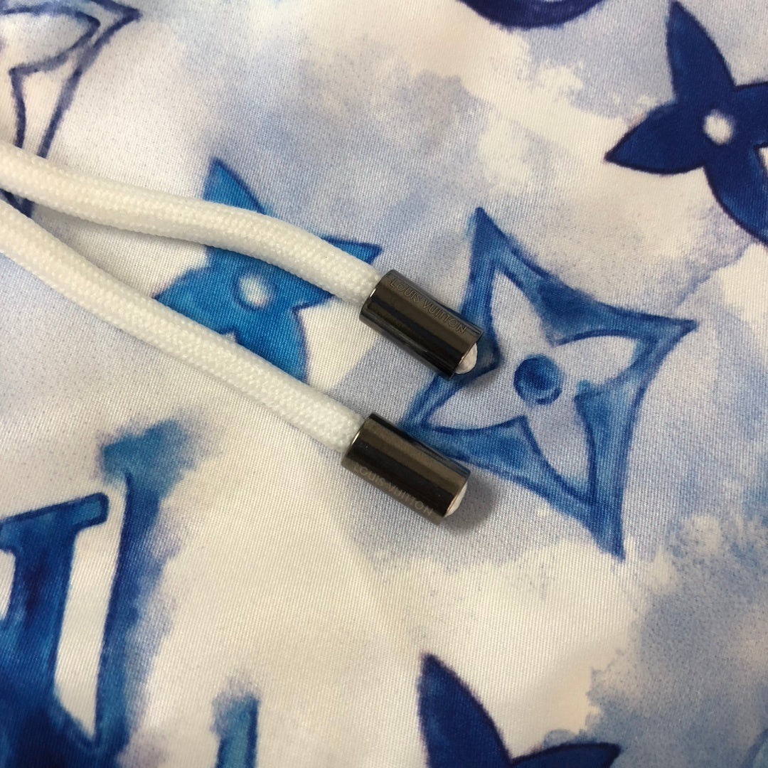 MONOGRAM SWIM SHORTS – BLUE TIE-DYE