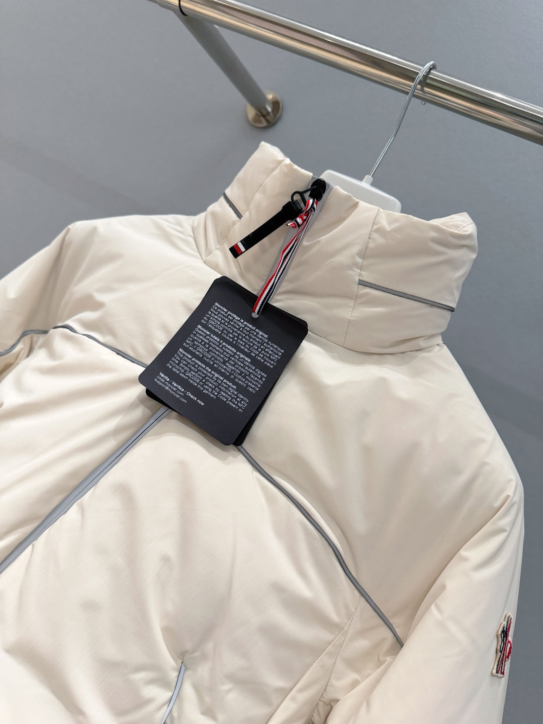 CROPPED PADDED JACKET WITH HIGH COLLAR AND TECH DETAILS