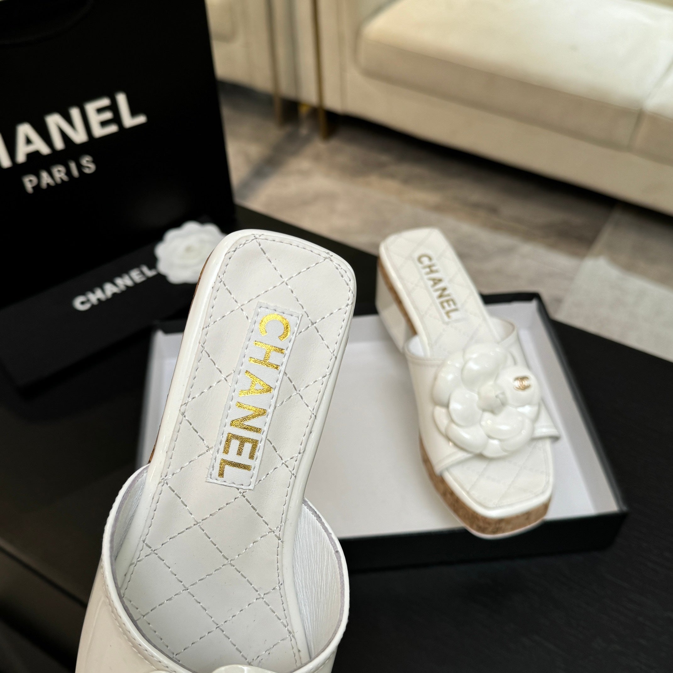 IVORY QUILTED PLATFORM SLIDE SANDALS WITH CAMELLIA DETAIL