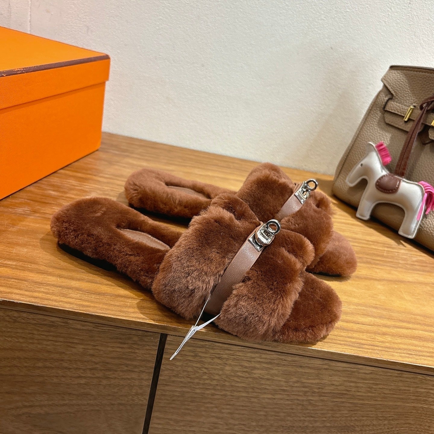 BROWN FAUX FUR MULE SLIPPERS WITH SILVER-TONE ACCENT