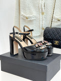 BLACK PATENT PLATFORM CRYSTAL HEELS
