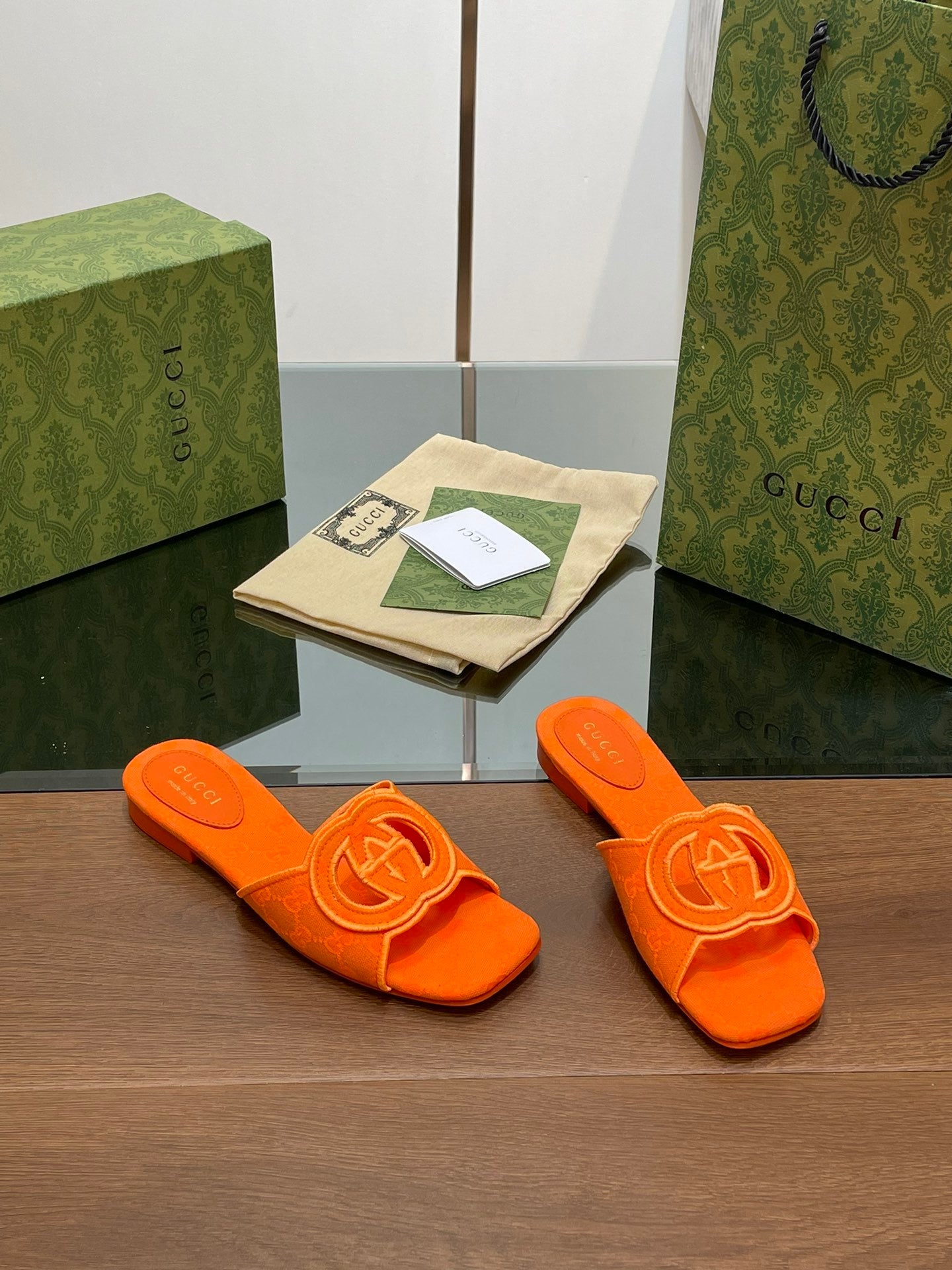 ORANGE EMBOSSED LOGO SLIDES