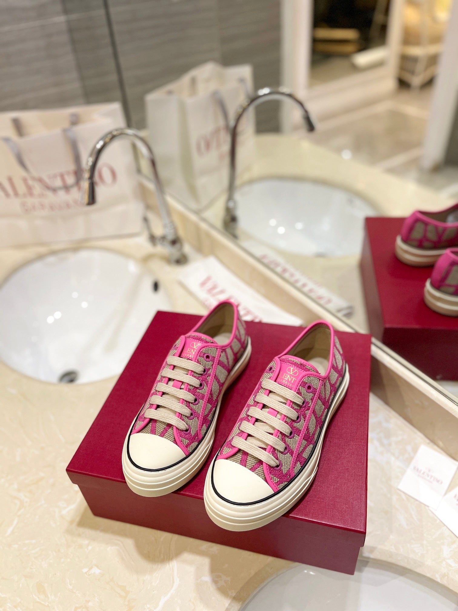 PINK MONOGRAM LOW-TOP SNEAKERS