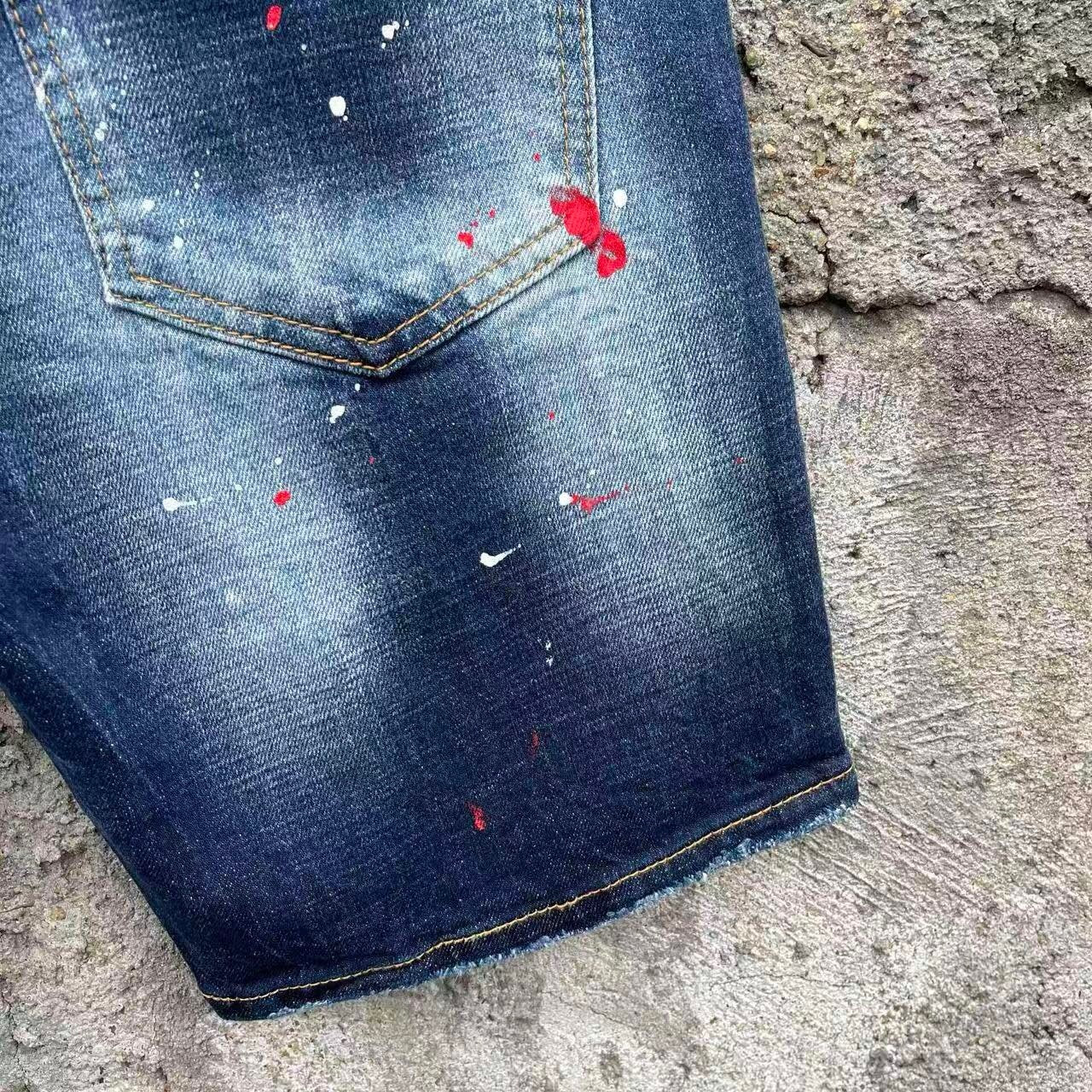 DISTRESSED PATCH DENIM SHORTS