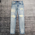 DISTRESSED LOGO PATCH SKINNY JEANS