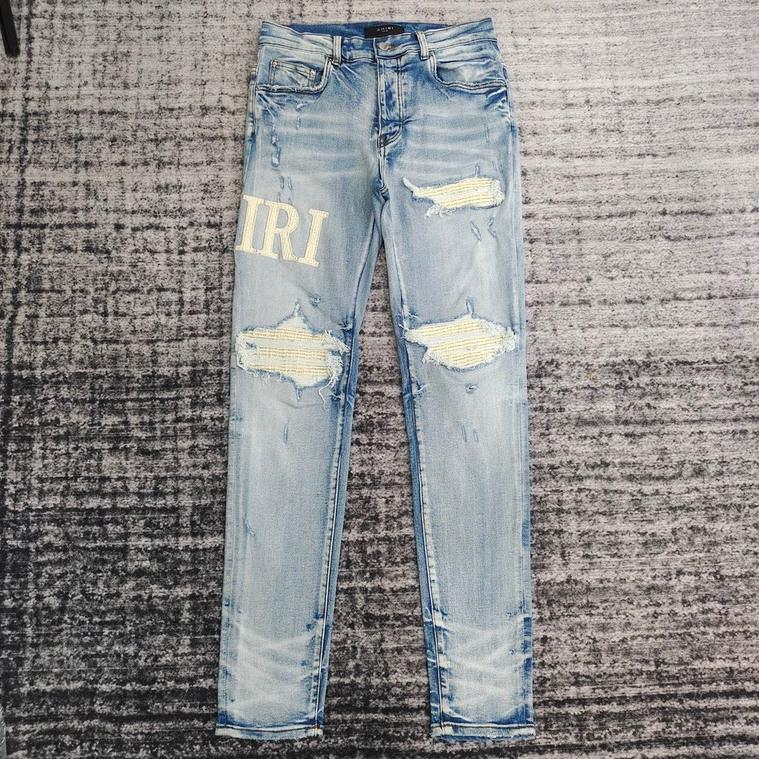 DISTRESSED LOGO PATCH SKINNY JEANS