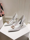 WHITE PATENT POINTED TOE HEEL PUMPS