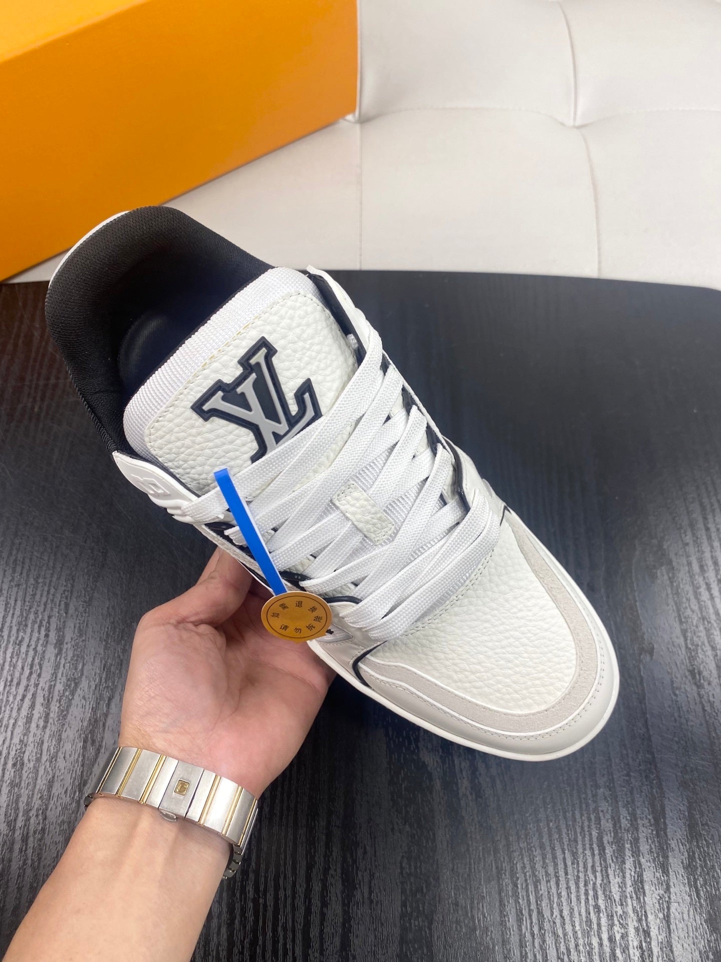 WHITE LOW-TOP SNEAKERS WITH BLACK ACCENTS