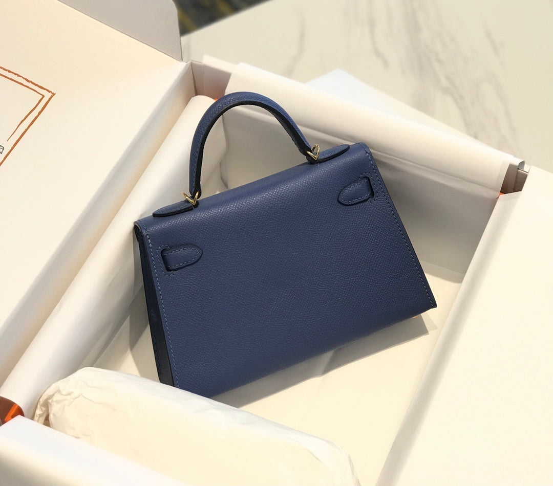 STRUCTURED TOP-HANDLE HANDBAG