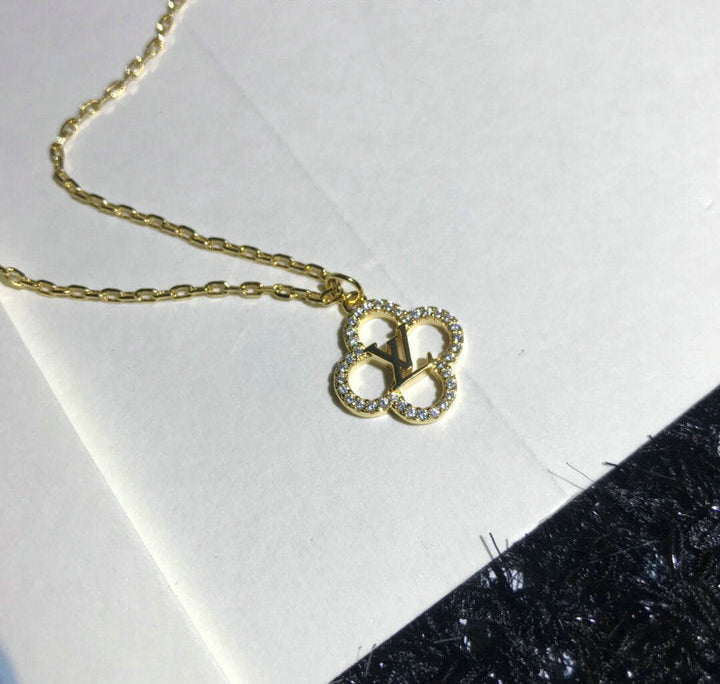 GOLD-TONE CRYSTAL CLOVER PENDANT NECKLACE