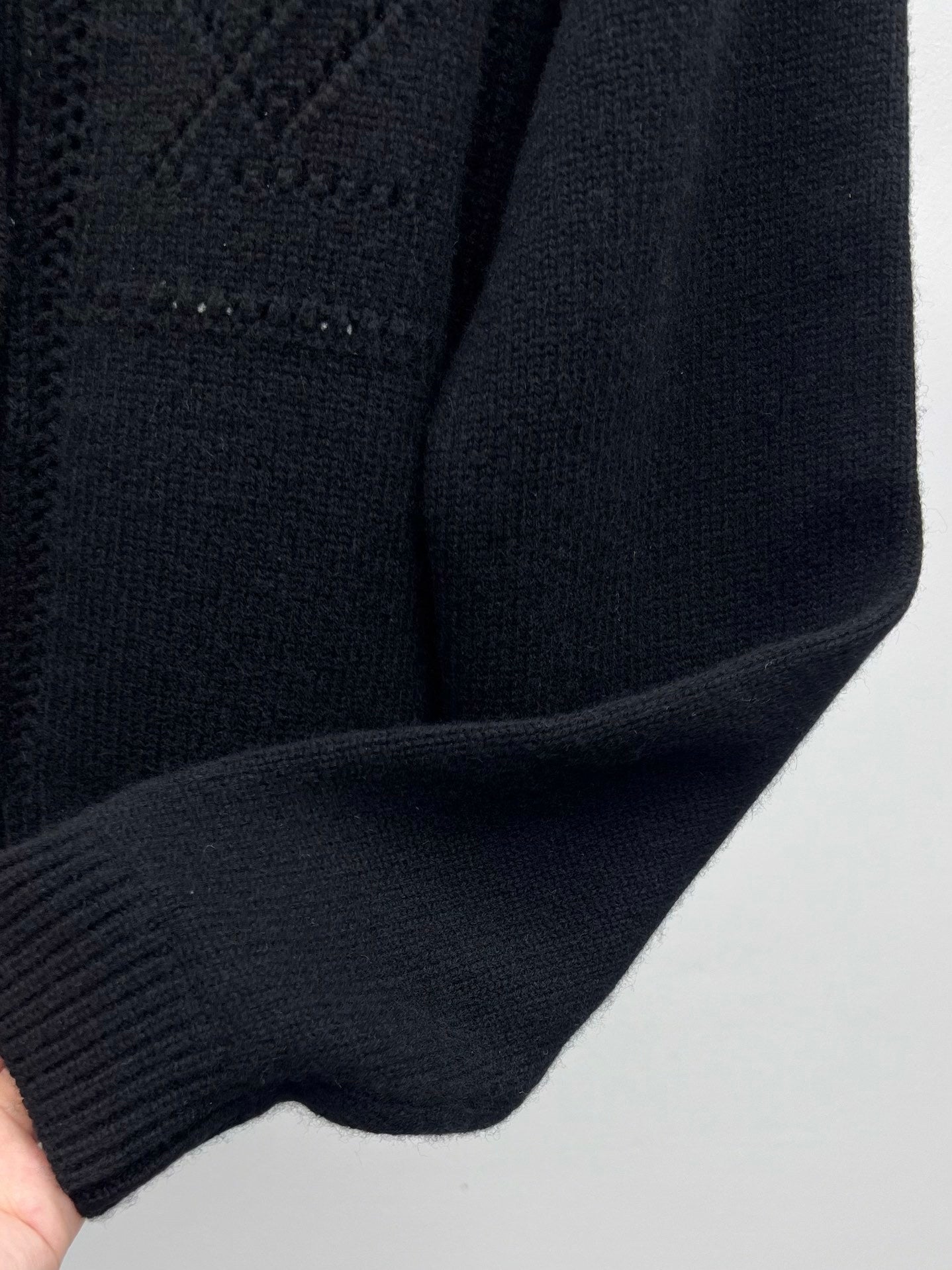 CROPPED KNIT CARDIGAN WITH RUFFLED COLLAR