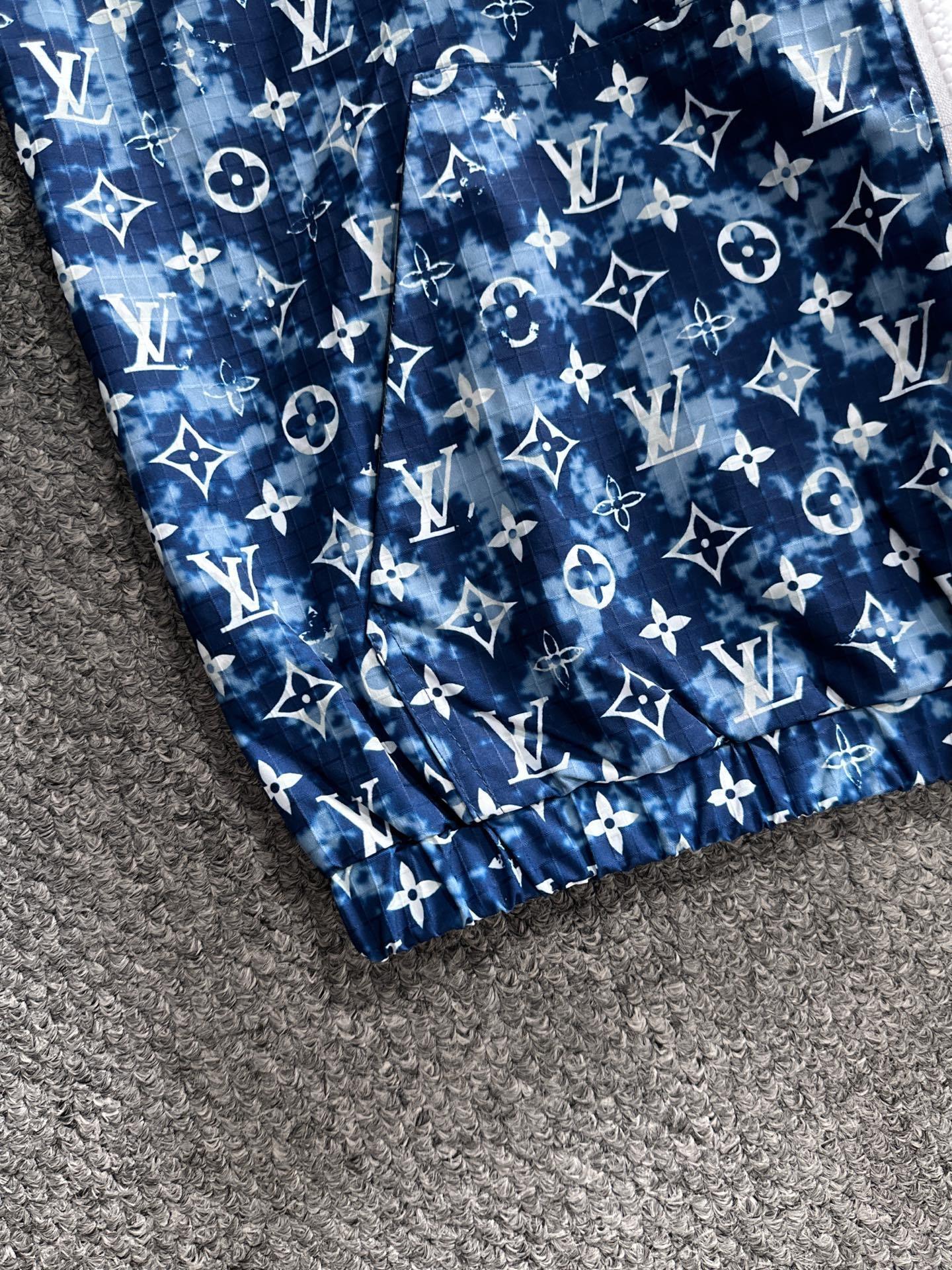 BLUE ALL-OVER PATTERN HOODED ZIP JACKET