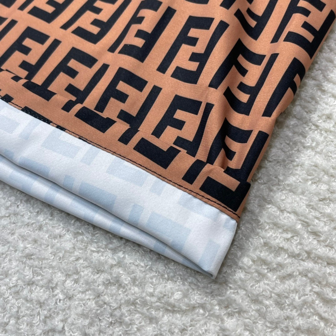 MONOGRAM SWIM SHORTS – BROWN