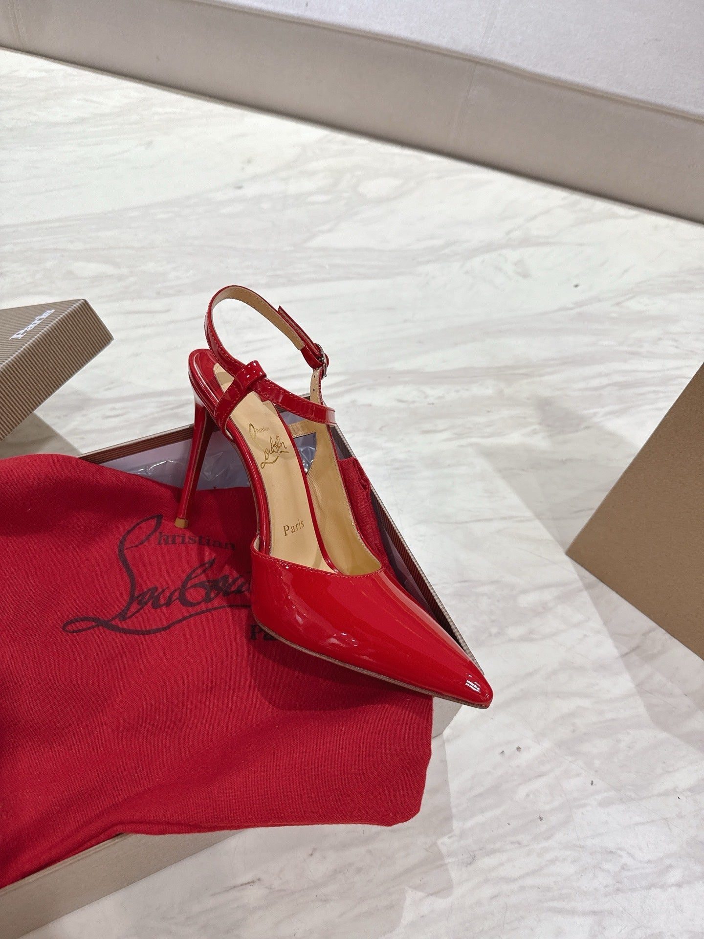 RED PATENT ANKLE-STRAP POINTED HEELS