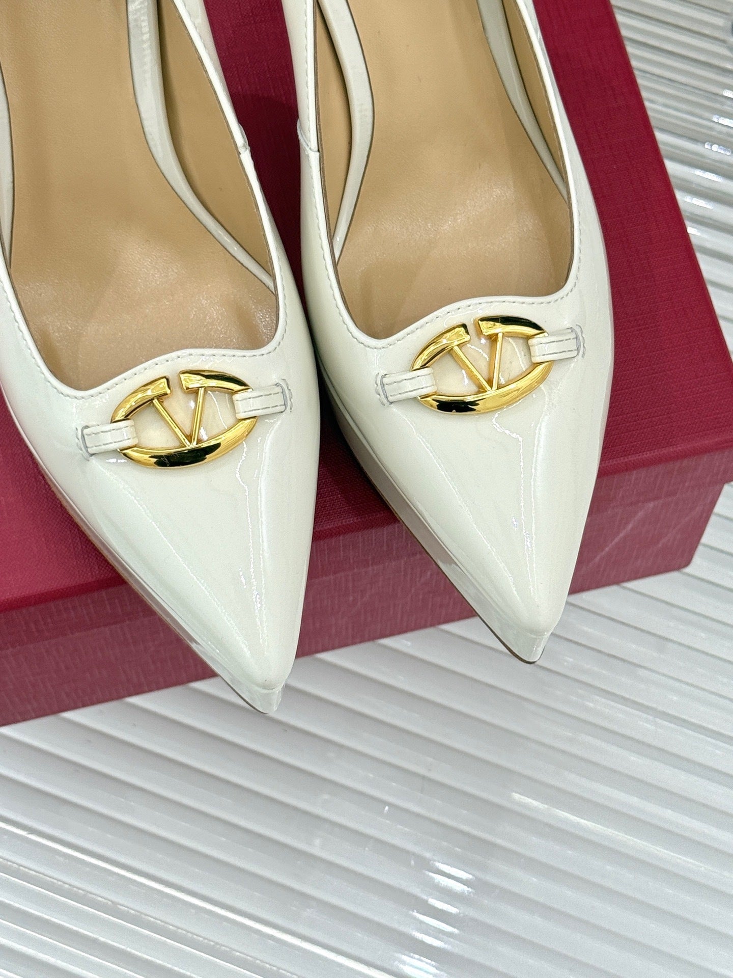 IVORY PATENT PLATFORM HEELS WITH GOLD ACCENT