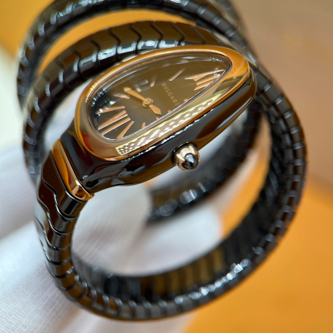 SERPENT WRAP WATCH – BLACK & GOLD ELEGANCE
