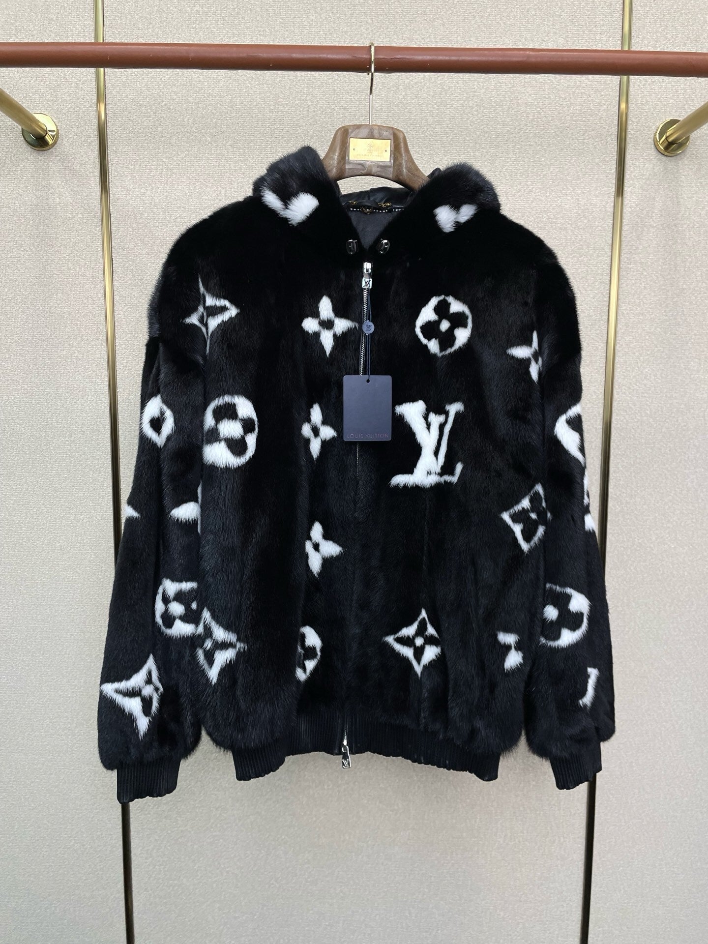 BLACK FAUX FUR HOODED JACKET WITH CONTRAST PATTERN