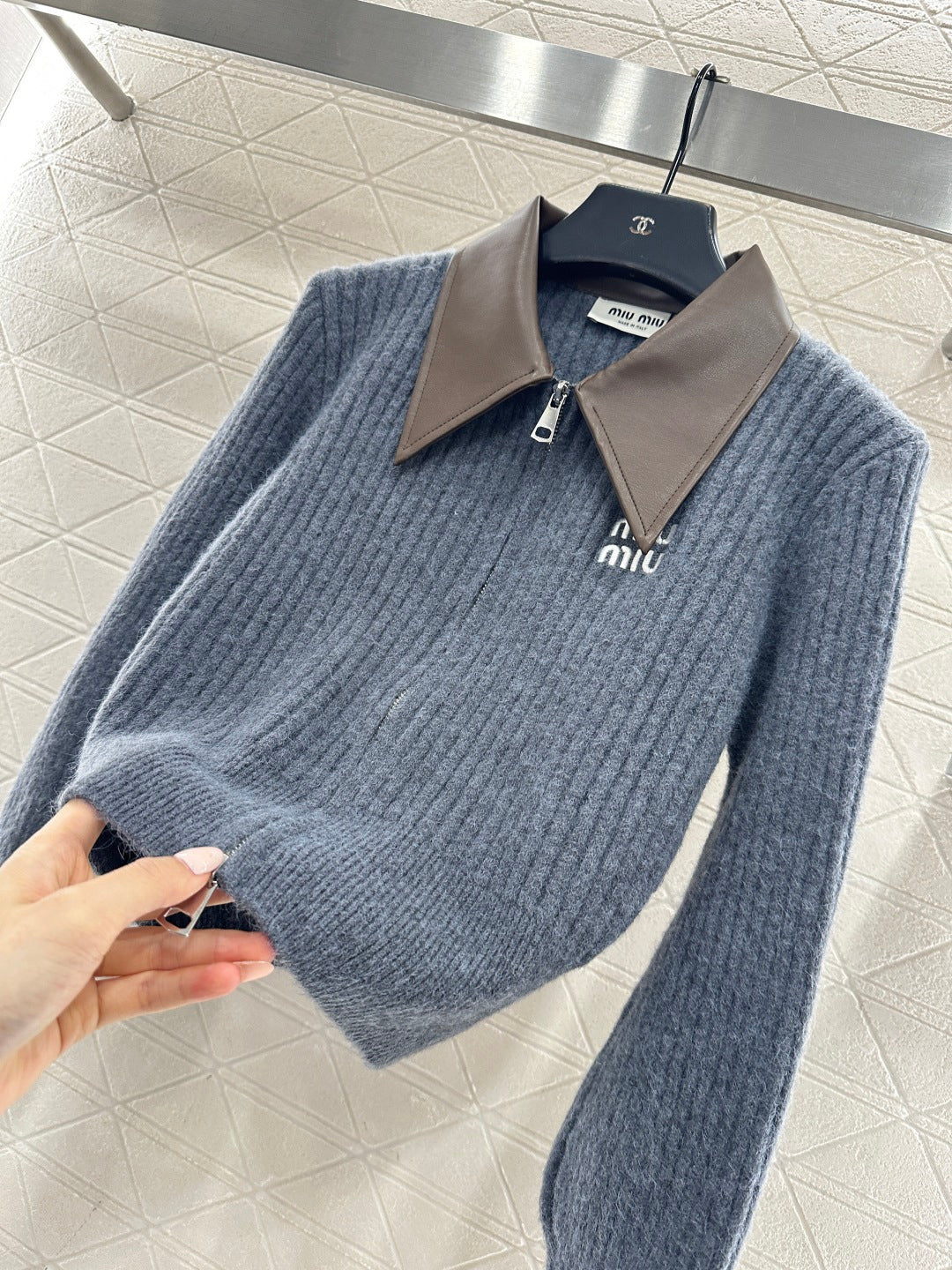 ZIP-UP RIBBED KNIT SWEATER