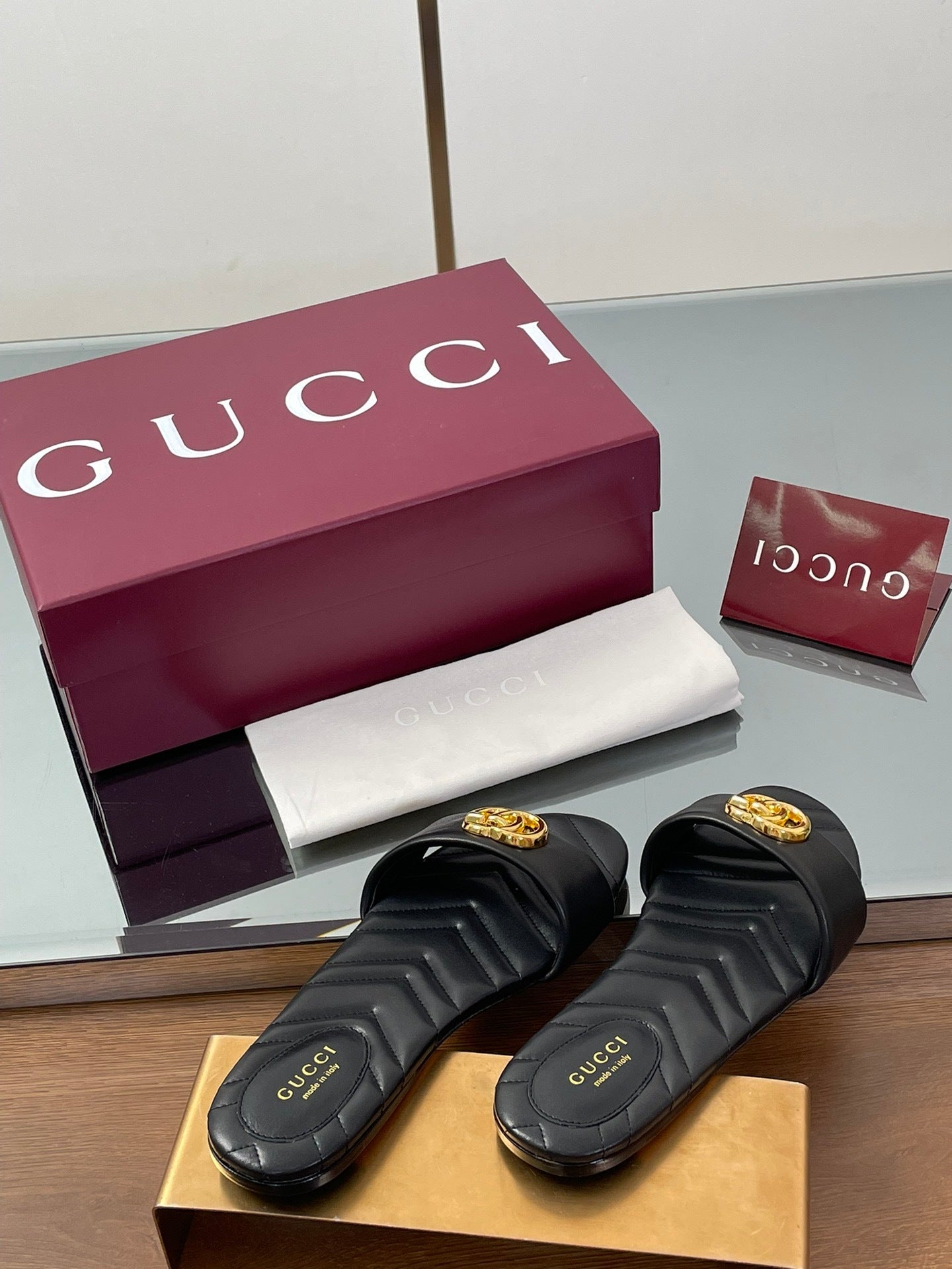 BLACK QUILTED SLIDE SANDALS