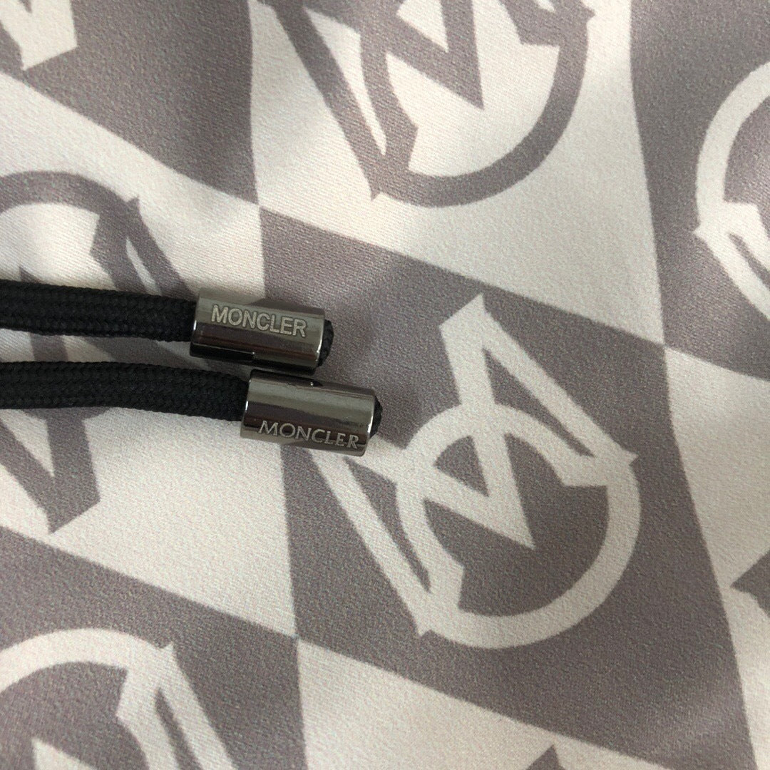 MONOGRAM PRINT SWIM SHORTS