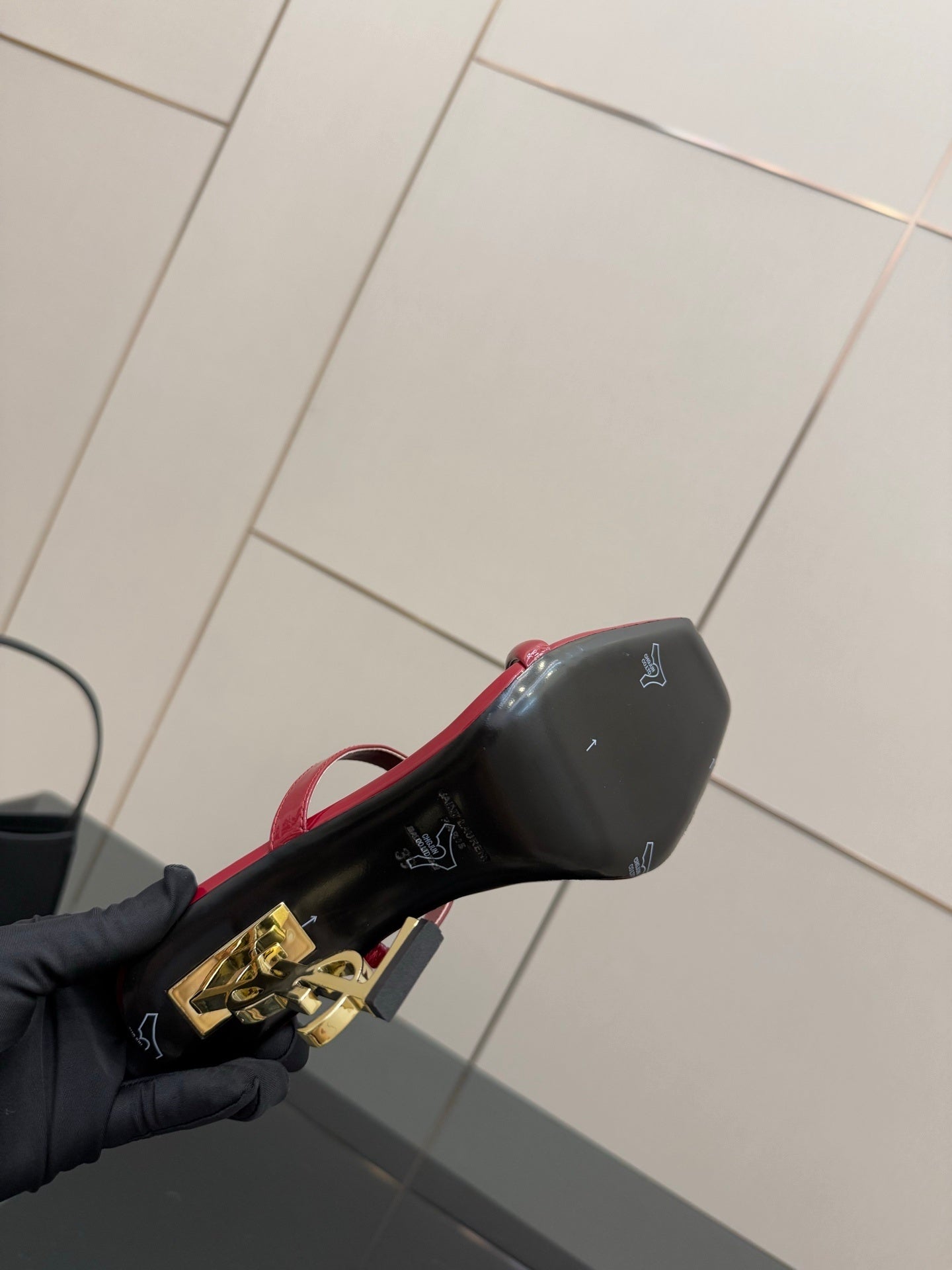 GLOSSY RED STRAPPY HEELS WITH GOLD LOGO HEEL