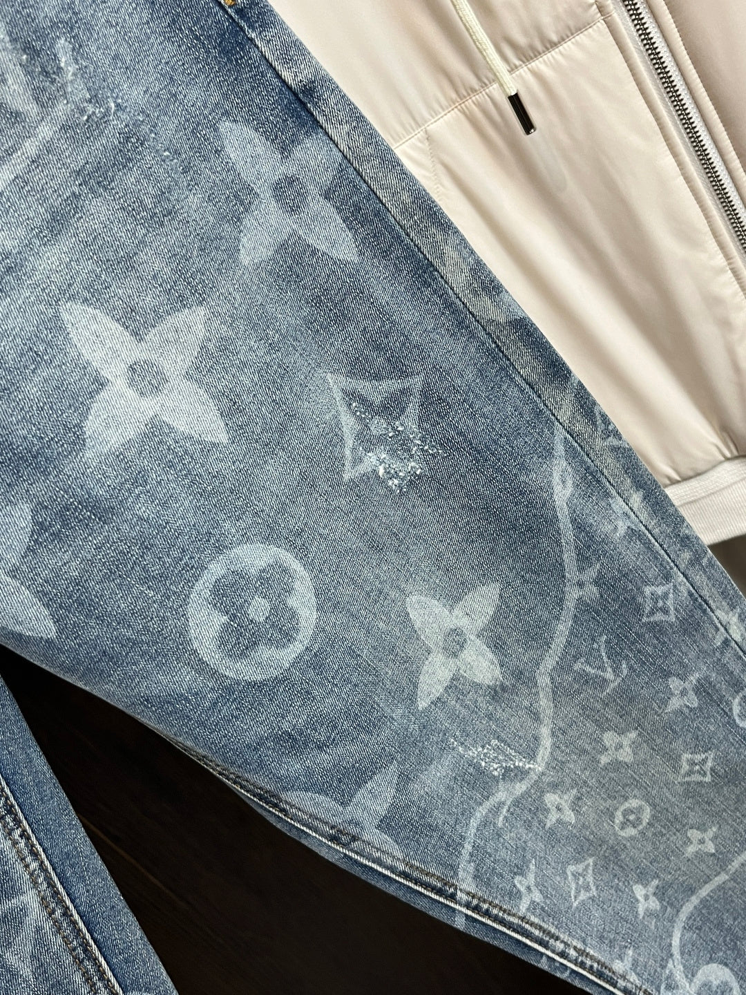 BLUE WASHED DENIM JEANS WITH MONOGRAM PATTERN