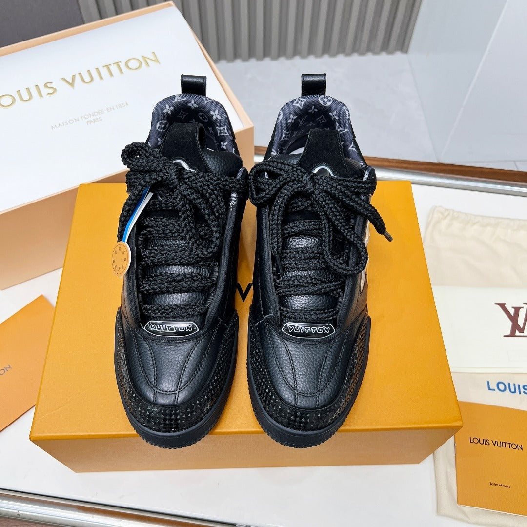 BLACK LEATHER PLATFORM SNEAKERS WITH TRANSLUCENT FLOWER DETAIL