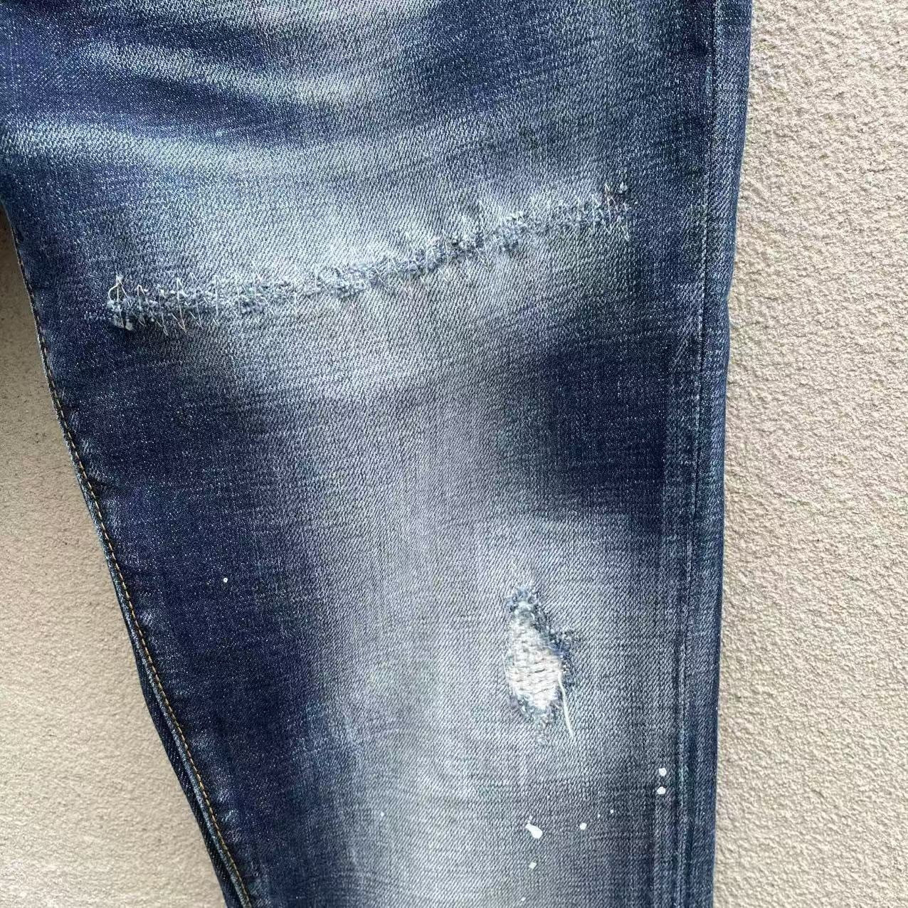 FADED DISTRESSED SLIM JEANS