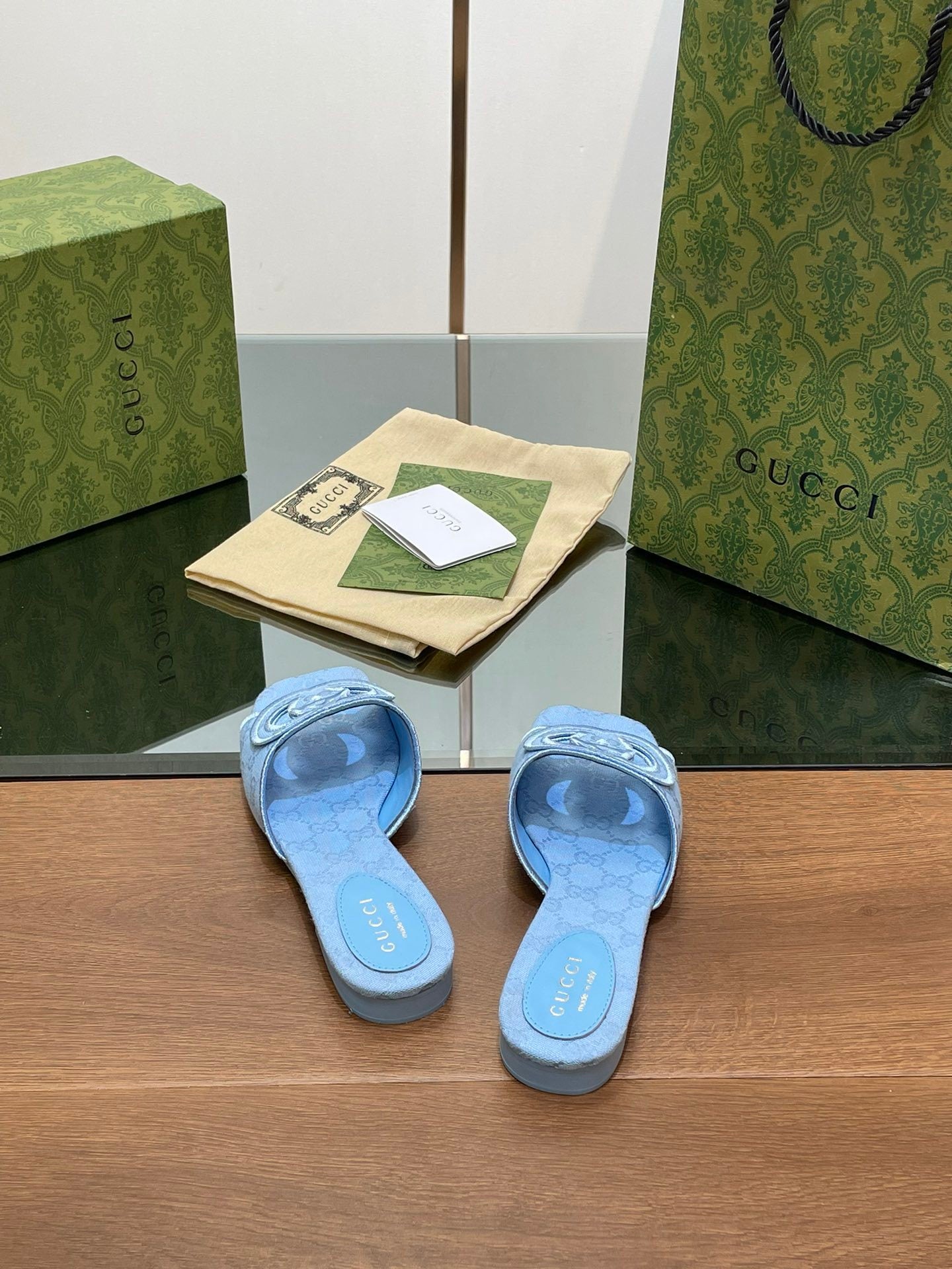 BLUE EMBOSSED LOGO SLIDES